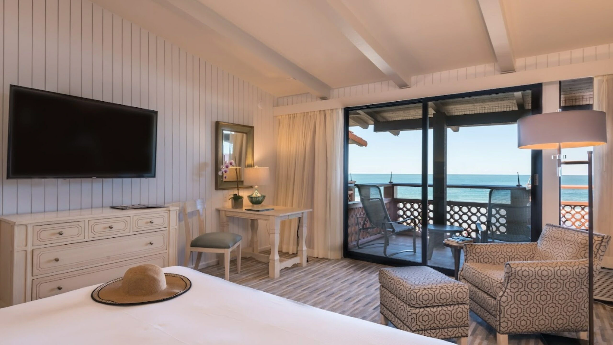 Suite with a balcony and beachfront view