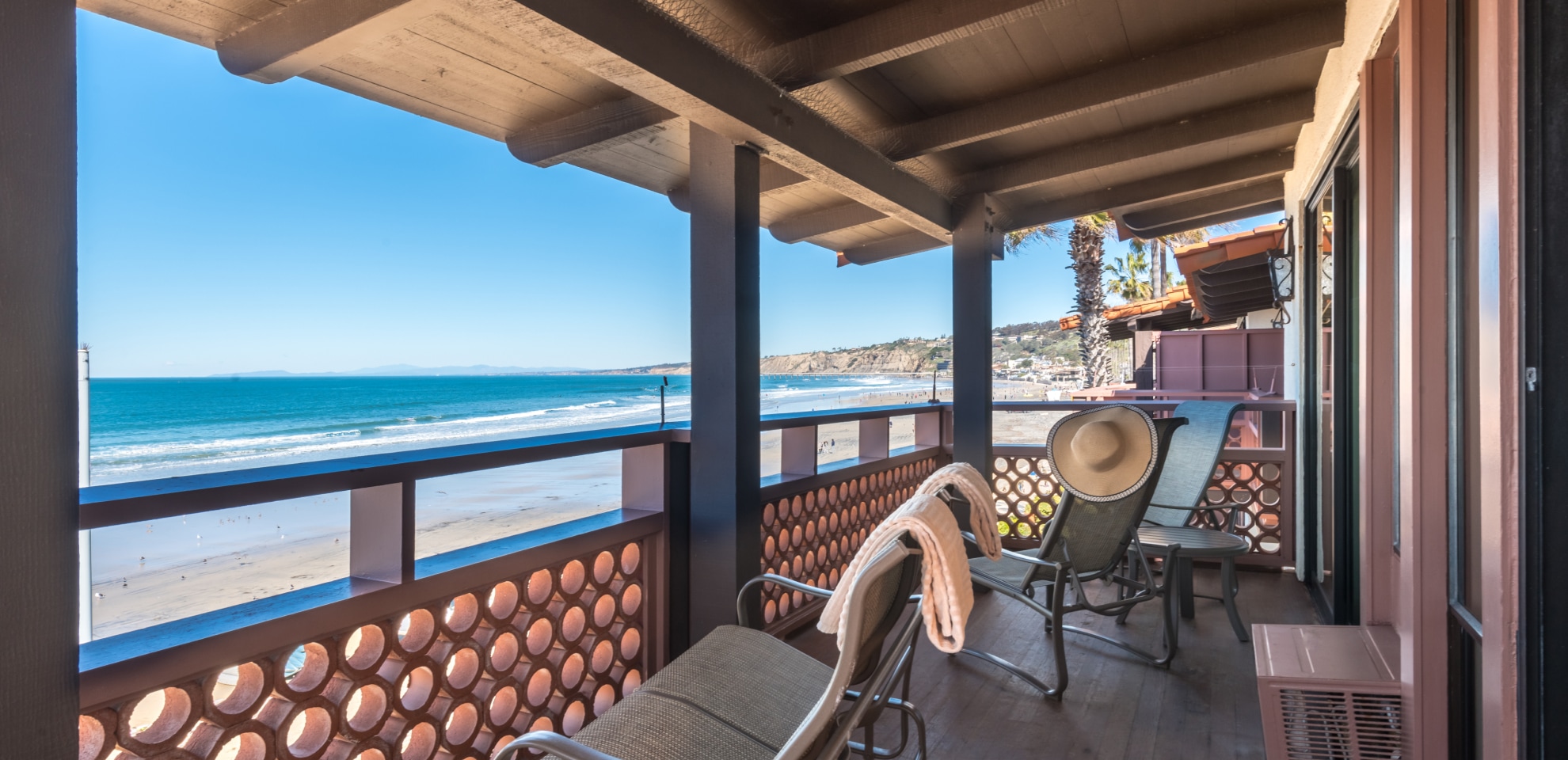 A balcony view of the Pacific Ocean beachfront in La Jolla